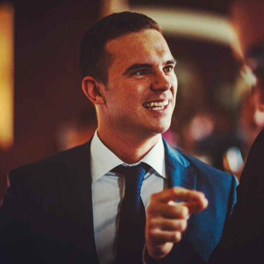 Our Story A young man smiling